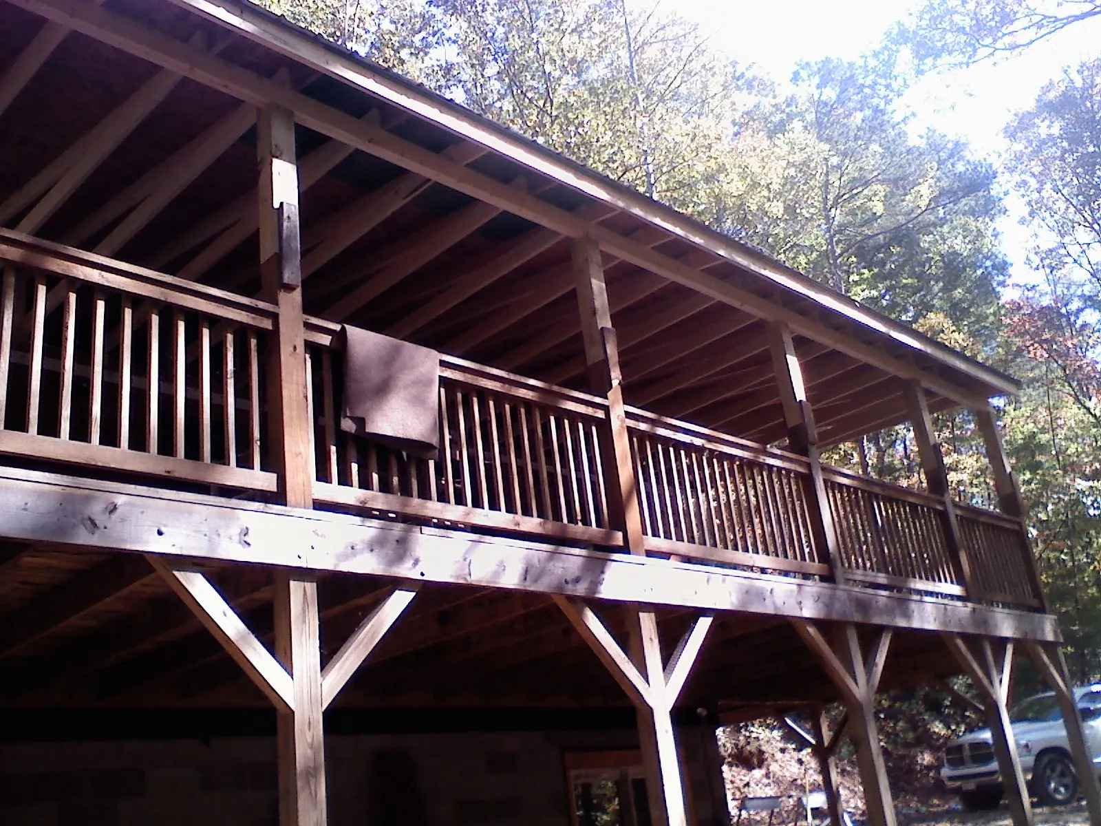 Timber framing under a new elevated porch and deck — Roof Leak Repair in Plato by Roofing Brothers